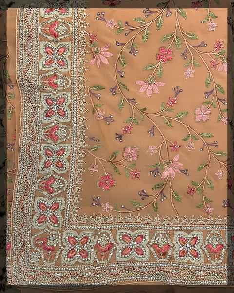 Peachy embroidered saree