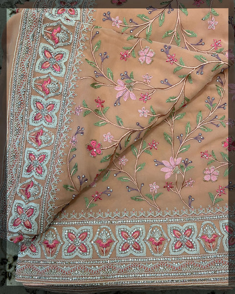 Peachy embroidered saree